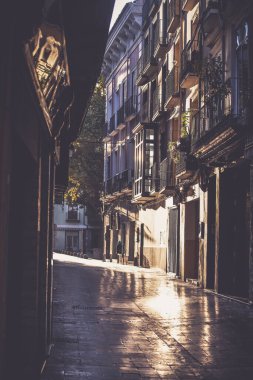 Narrow strees of Zaragoza in sunrise, Spain