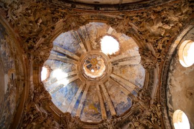  A bottom view of a damaged dome of the old church in the city of Belchite in Spain