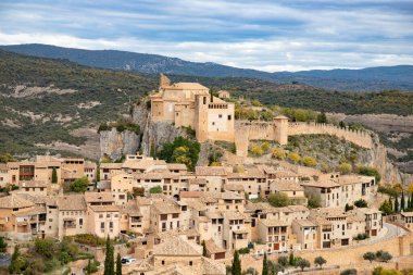 View of the typical spanish medieval village of Alquezar above Vera river in Aragon region, Huesca, Spain