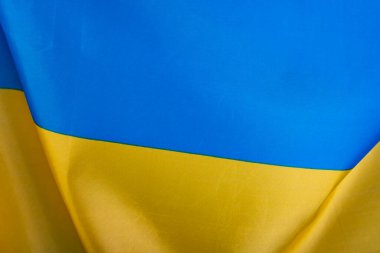 Ukrayna bayrağı, UA. Mavi ve sarı renkler. Yakın çekim, arkaplan