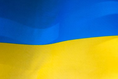 Ukrayna bayrağı, UA. Mavi ve sarı renkler. Yakın çekim, arkaplan