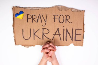 Ukrayna kavramı için dua et. Ukrayna 'da yardım ve savaşın olmayışının sembolü. 
