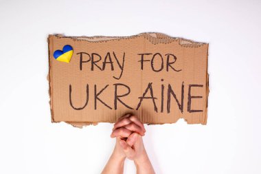 Ukrayna kavramı için dua et. Ukrayna 'da yardım ve savaşın olmayışının sembolü. 