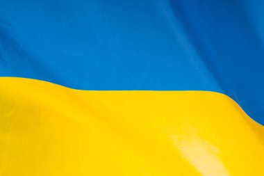 Ukrayna bayrağı. Mavi ve sarı renkler. Yakın çekim, arkaplan