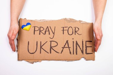 Ukrayna kavramı için dua et. Ukrayna 'da yardım ve savaşın olmayışının sembolü. 