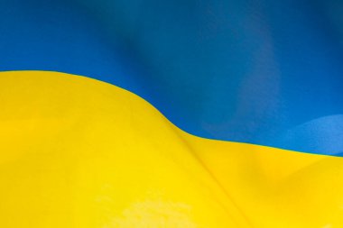 Ukrayna bayrağı, UA. Mavi ve sarı renkler. Yakın çekim, arkaplan