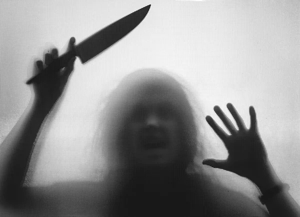 Horror Halloween Háttér Shadowy Figura Üveg Mögött Kezében Egy Kést — Stock Fotó
