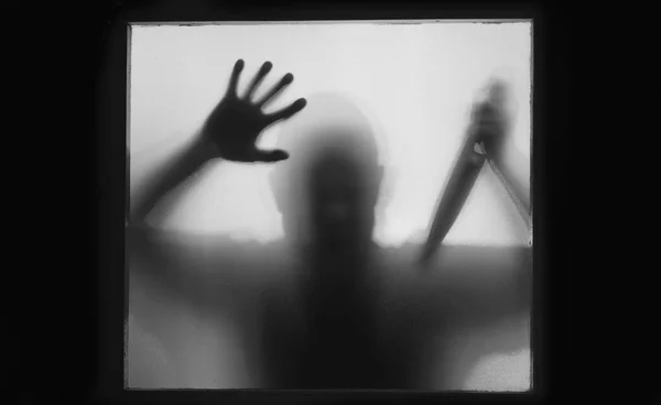 Horror Halloween Background Shadowy Figure Glass Man Holding Knife — Stock Photo, Image