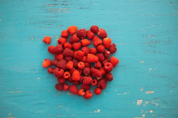 Flat Lay Red Fresh Raspberries Turquoise Rustic Wood Background — Stockfoto