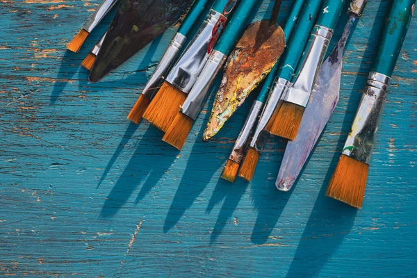 Artistic Art Supply Utensils Paintbrushes Turquoise Wooden Background Copy Space — Photo
