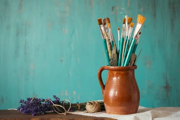 Still Life Paint Brushes Clay Jug Lavender Flower Vintage Turquoise — Photo