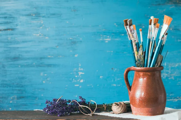 Still Life Paint Brushes Clay Jug Lavender Flower Vintage Turquoise — Photo