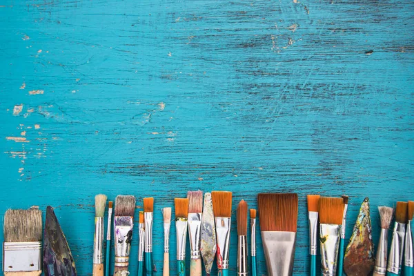 Artistic Art Supply Utensils Paintbrushes Turquoise Wooden Background Copy Space — Photo