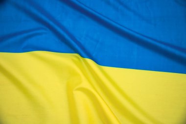 Ukrayna bayrağı, UA. Mavi ve sarı renkler. Yakın çekim, arkaplan
