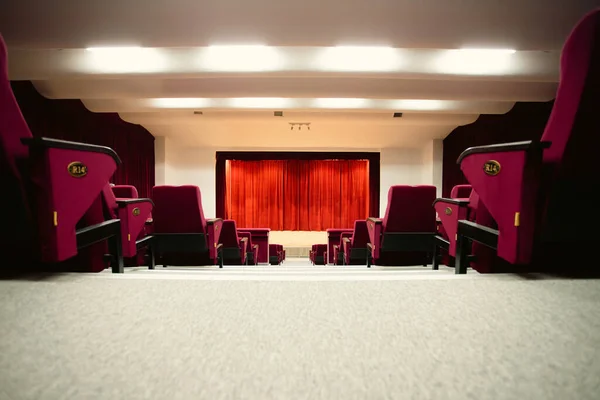 Theater curtain and stage with dramatic lighting