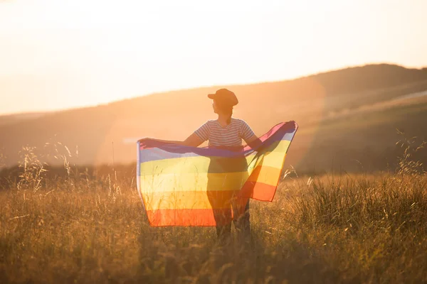 Woman Holding Gay Rainbow Flag Magic Sunset Happiness Freedom Love — Stockfoto