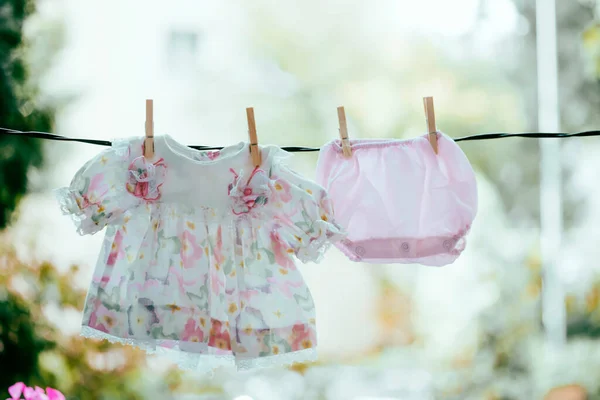 Cute Baby Girl Clothes Hanging Clothesline — Stock Photo, Image