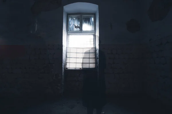 Mysterious Figure Wearing Long Coat Fedora Standing Ruined Abandoned House — Φωτογραφία Αρχείου