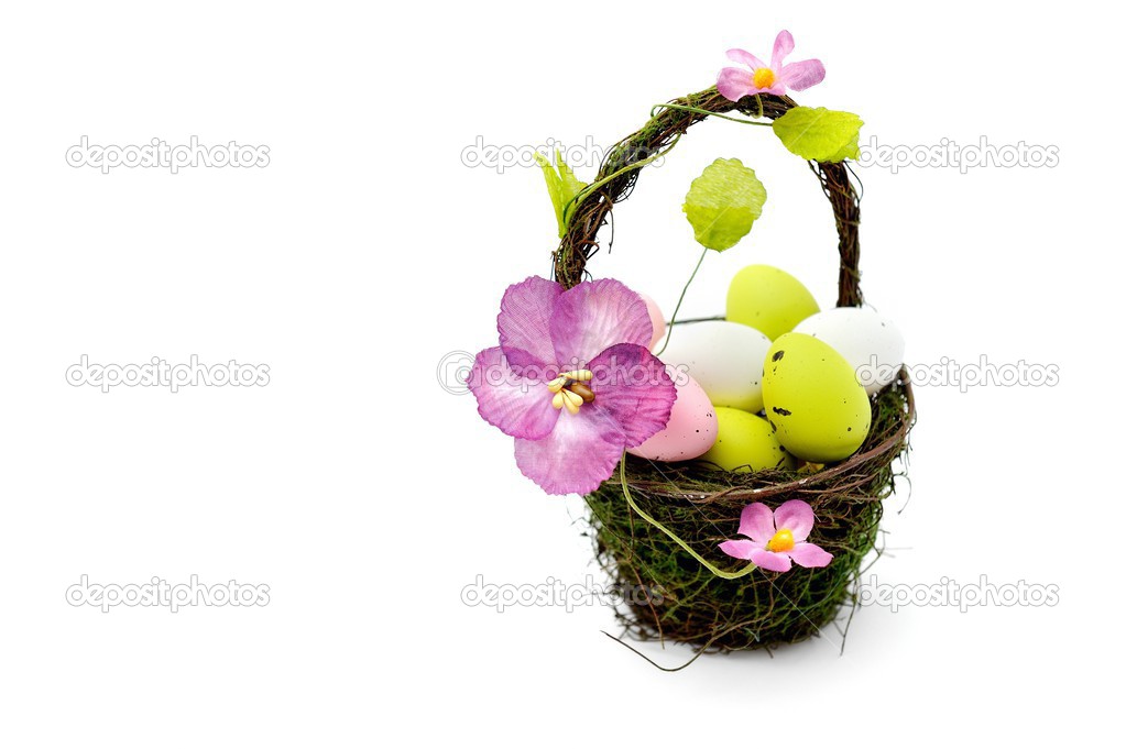 Colorful painted easter eggs in basket