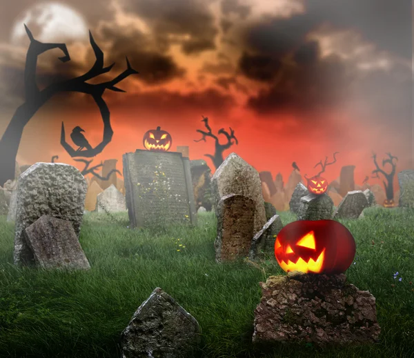 Begraafplaats met gloeiende pumpkins — Stockfoto