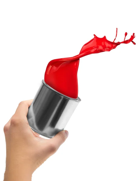 Red paint splashing out of can — Stock Photo, Image