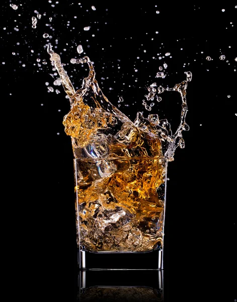 Close-up of glass with whisky — Stock Photo, Image