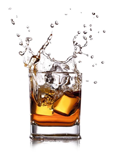Whiskey splash with ice cubes — Stock Photo, Image