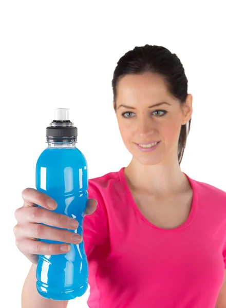Feliz joven fitness mujer sosteniendo botella —  Fotos de Stock