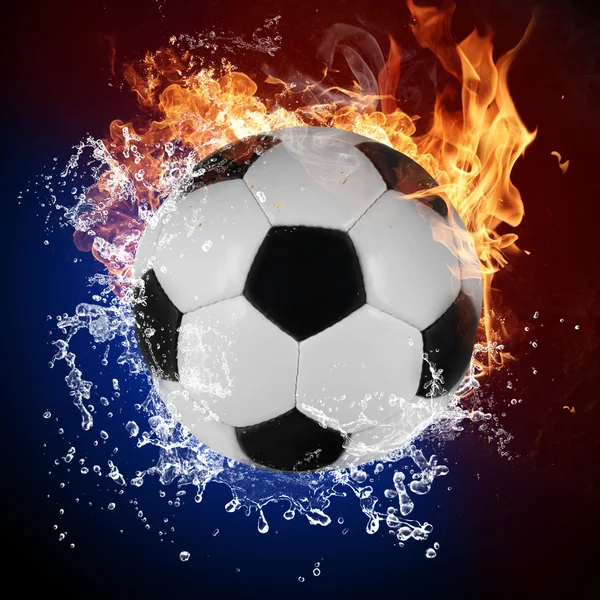 Soccer ball in fire flames and splashing water — Stock Photo, Image