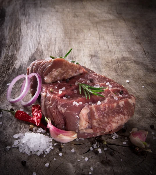 Raw beef steaks — Stock Photo, Image