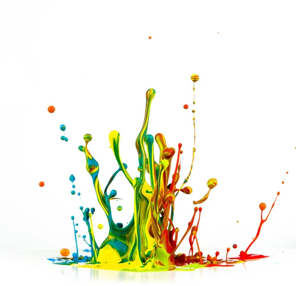 Colorful paint splashing — Stock Photo, Image