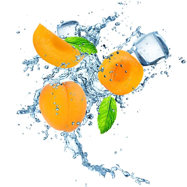 Apricot in water splash — Stock Photo, Image