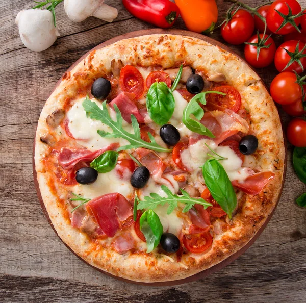 Delicious italian pizza — Stock Photo © Kesu01 34785059