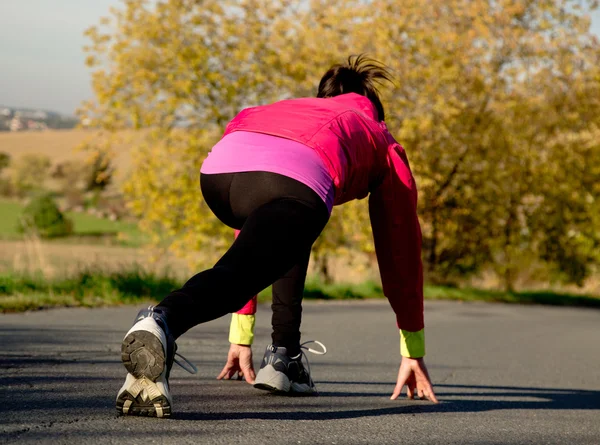 Young woman running — Stock Photo, Image