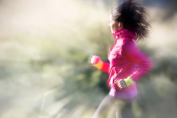 Young woman running — Stock Photo, Image