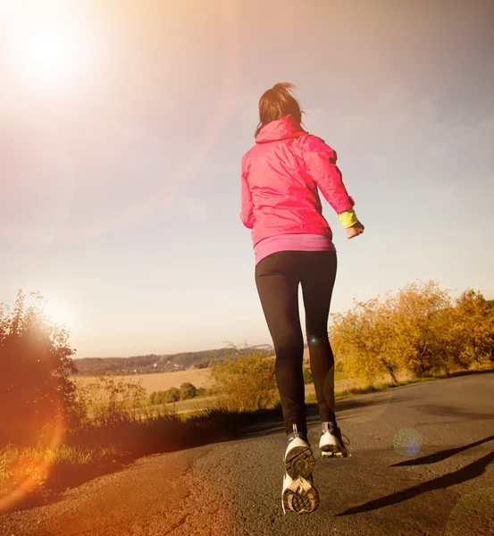 Young woman running — Stock Photo, Image