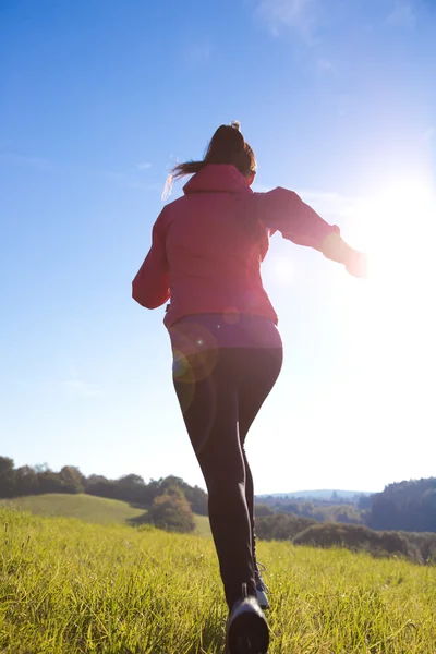 Mujer joven corriendo —  Fotos de Stock