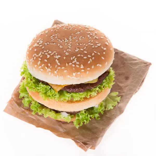 Delicious hamburger over white — Stock Photo, Image