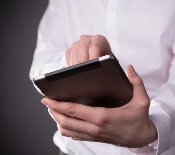 Hand touching digital tablet — Stock Photo, Image