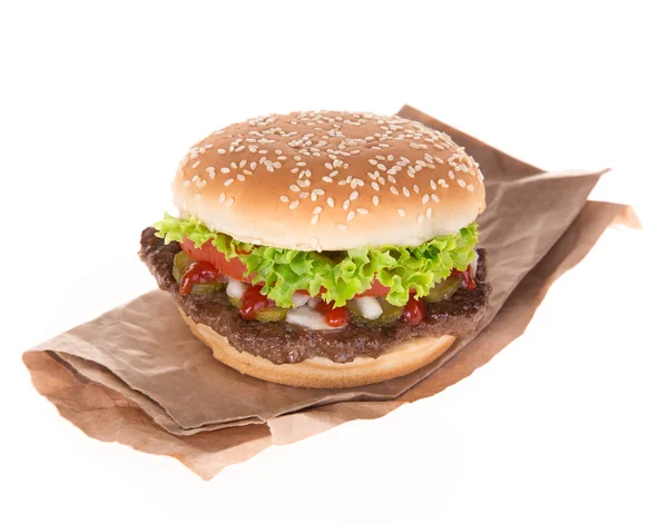 Leckerer Hamburger über weißem — Stockfoto