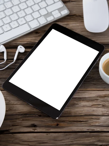 Espacio de trabajo con tablet y café —  Fotos de Stock