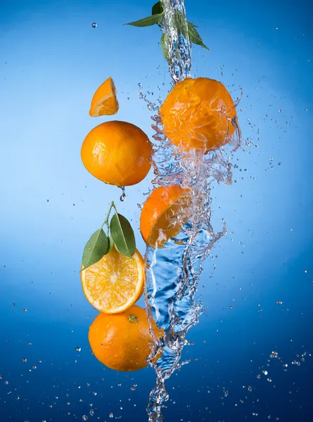 Oranges with water splash — Stock Photo, Image