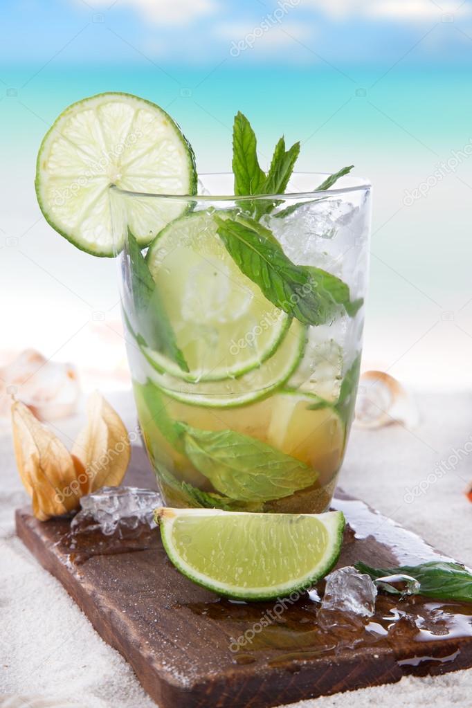 Mojito cocktails on wooden background