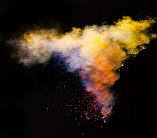 Colored powder in abstract shape isolated on black background — Stock Photo, Image