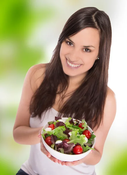Jonge brunette meisje met gezond voedsel — Stockfoto