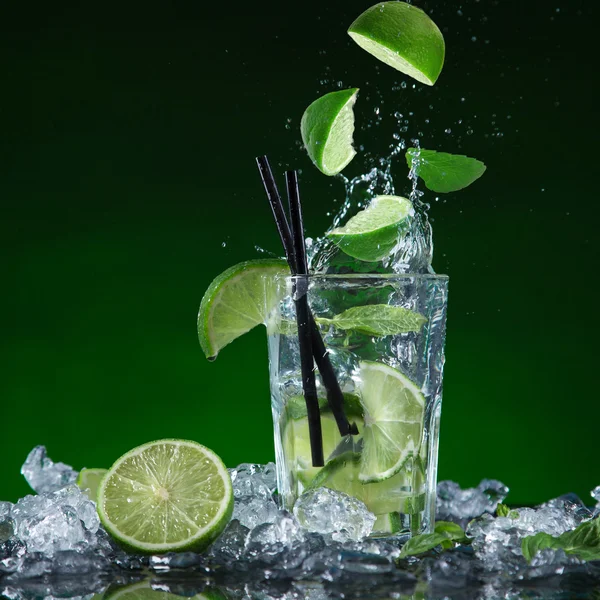 Fresh fruit cocktail with liquid splash — Stock Photo, Image