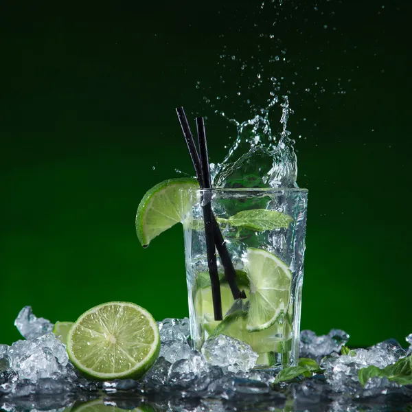 Fruit cocktail with splashing liquid — Stock Photo, Image