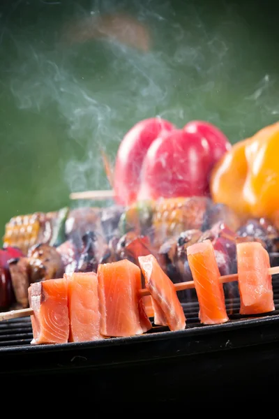 Delicious skewers on grill — Stock Photo, Image