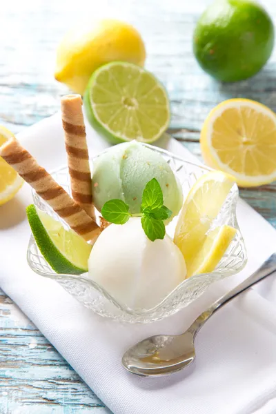 Ice cream scoops on wooden table