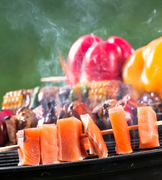Tasty skewers on the grill. — Stock Photo, Image